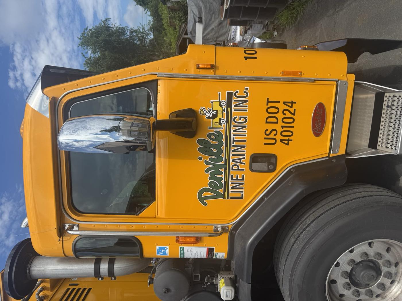 Denville Line Painting logo on a fleet truck door